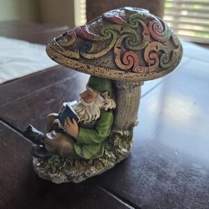 Gnome Napping Under A Toadstool While Reading A Book
